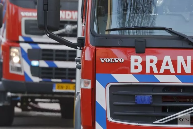 Kliko&#39;s in brand bij bedrijf in Gorredijk